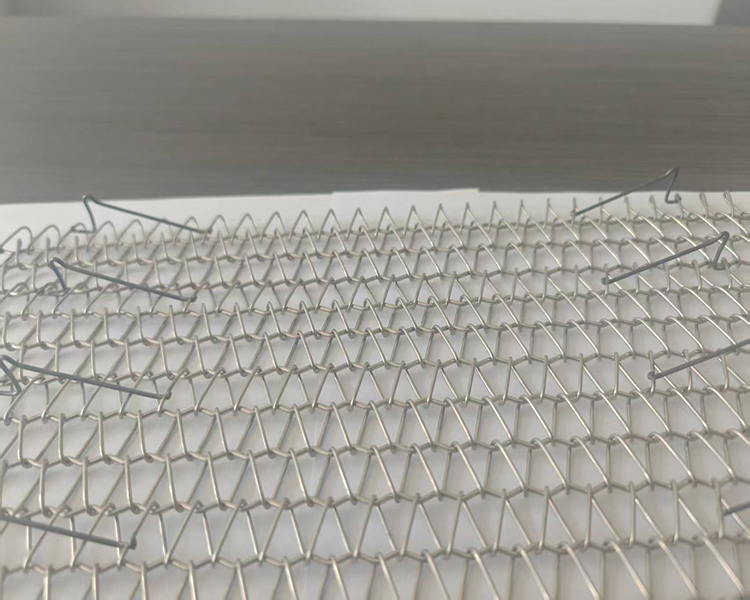 high-temp-conveyor-belt-ti-plated-standoff-microstructure-52pct-wear-reduction